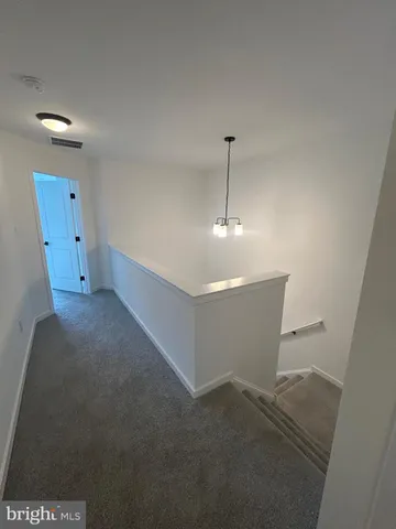 a bathroom with a double vanity sink mirror and double