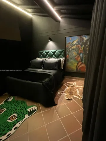 a lobby with furniture and a potted plant