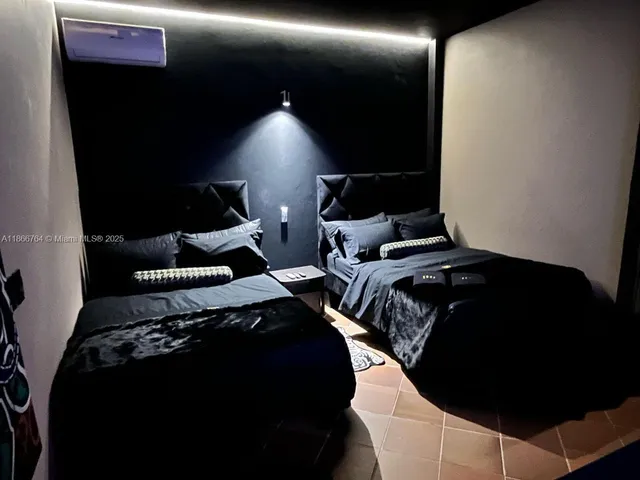 a view of backyard with swimming pool and outdoor seating