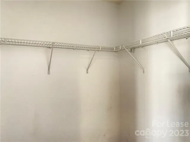 a view of a room with racks on the wall