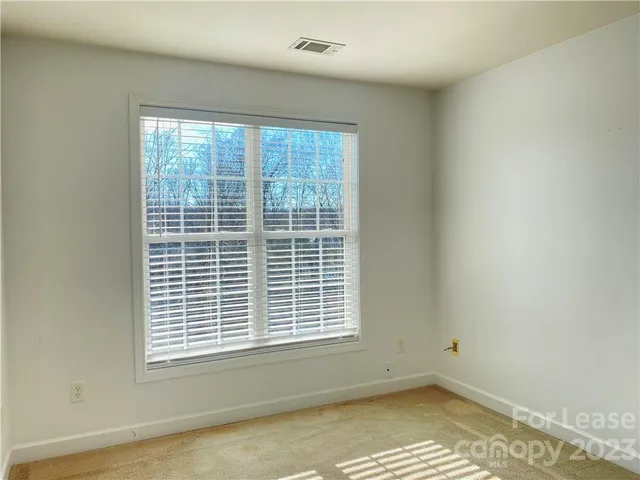 a view of a room with a window
