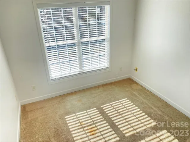 a view of a room with a window