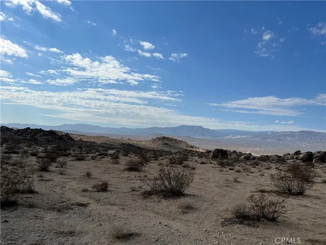 a view of lake and mountain
