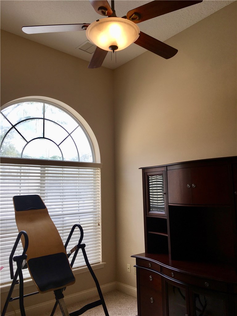 96525 Chester Road Yulee, FL 32097 - Photo 19 of 35 a view of a workspace with furniture