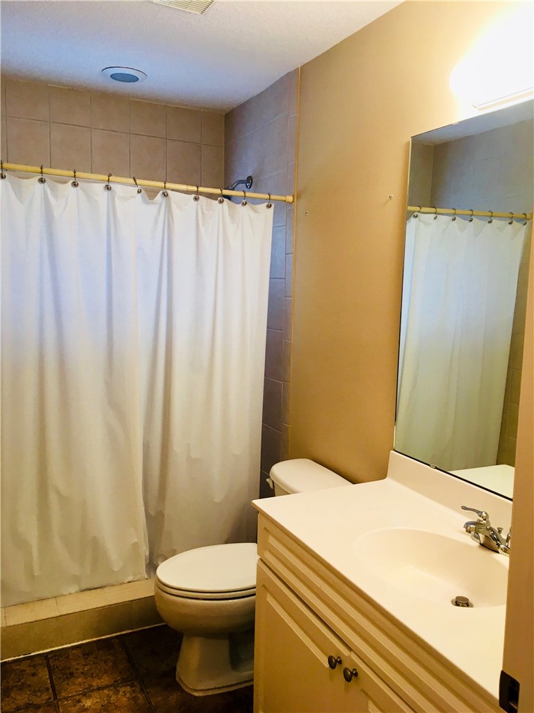 96525 Chester Road Yulee, FL 32097 - Photo 26 of 35 a bathroom with a sink and a toilet