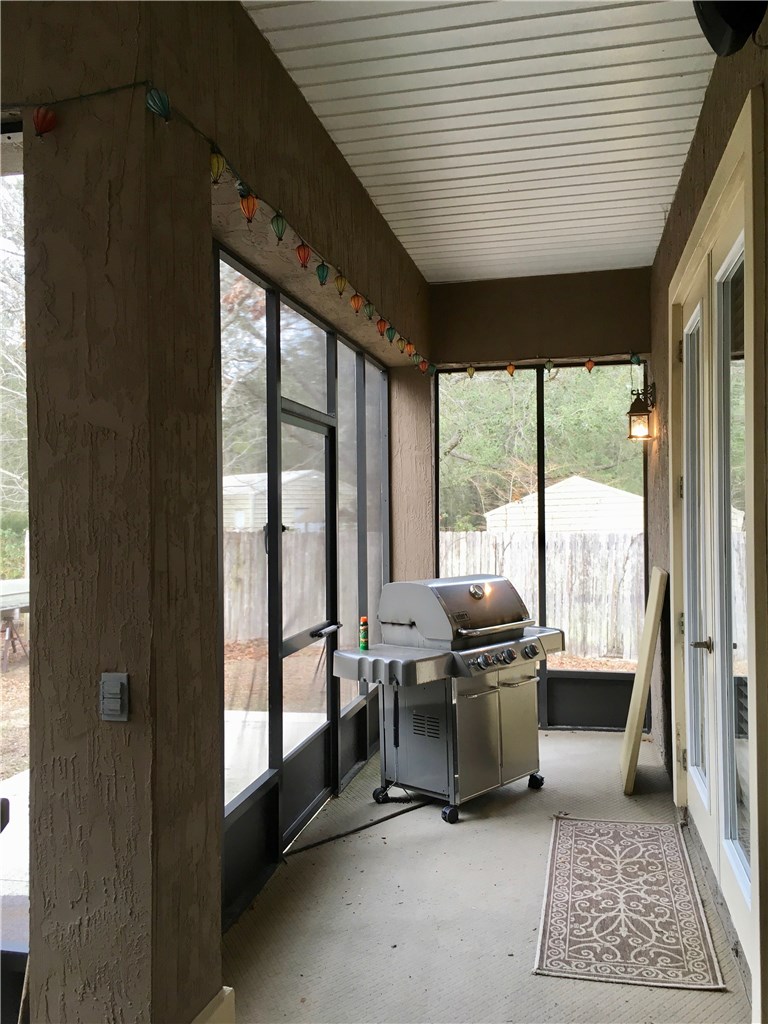 96525 Chester Road Yulee, FL 32097 - Photo 29 of 35 a kitchen with stainless steel appliances granite countertop a stove a sink and a dishwasher
