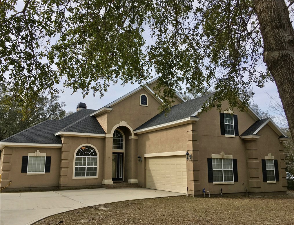96525 Chester Road Yulee, FL 32097 - Photo 31 of 35 a house view with a outdoor space