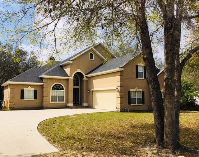 96525 Chester Road Yulee, FL 32097 - Photo 33 of 35 a house view with a outdoor space