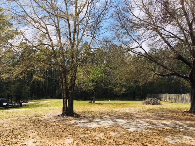 96525 Chester Road Yulee, FL 32097 - Photo 34 of 35 a view of swimming pool with an outdoor space