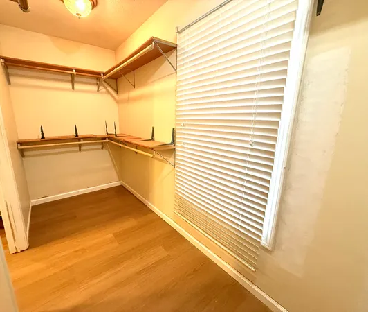 a view of a room with racks on the wall