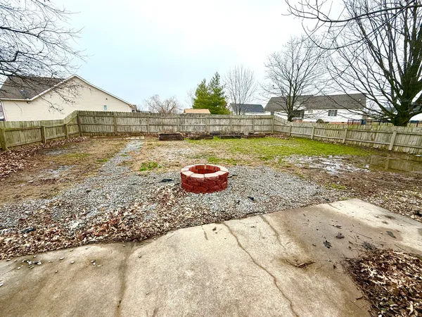 a view of swimming pool with a yard