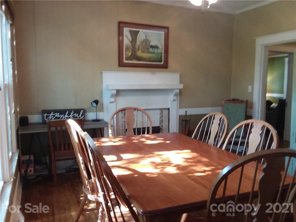 55 Hunter Bridge Road Stony Point, NC 28678 - Photo 11 of 32 a view of a dining room with furniture