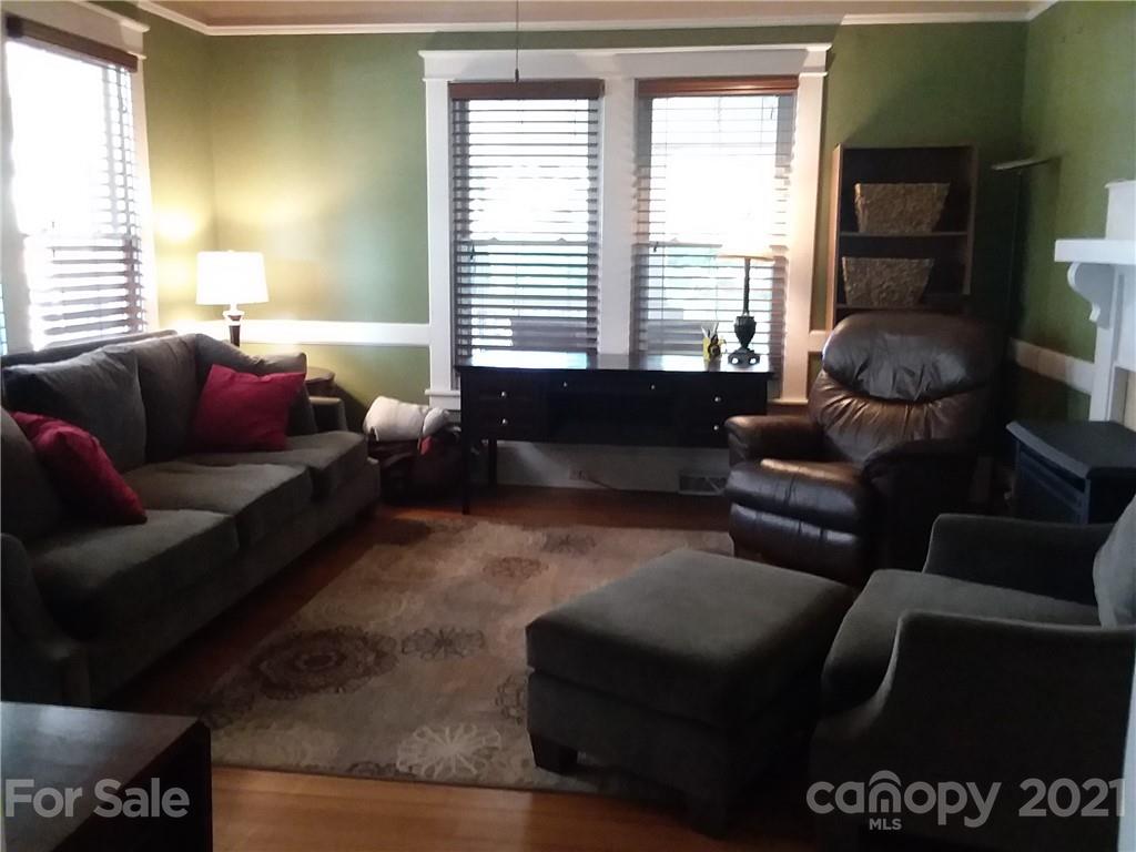 55 Hunter Bridge Road Stony Point, NC 28678 - Photo 13 of 32 a living room with furniture and a window