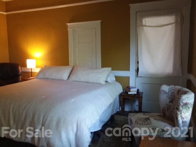 55 Hunter Bridge Road Stony Point, NC 28678 - Photo 16 of 32 a bedroom with a bed and a window