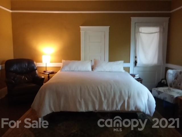55 Hunter Bridge Road Stony Point, NC 28678 - Photo 18 of 32 a bedroom with a bed and teddy bear on dresser