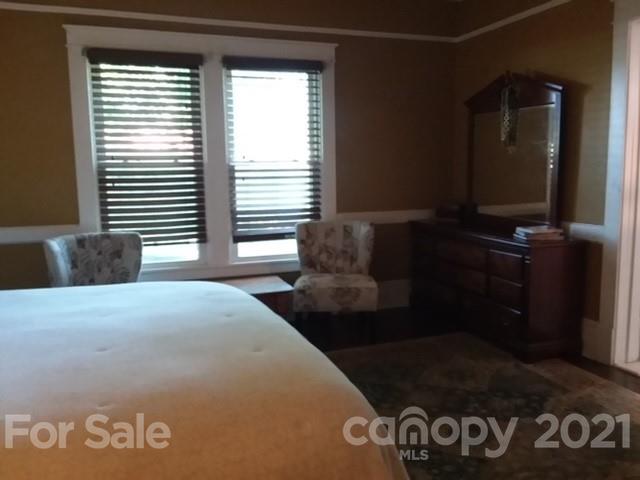 55 Hunter Bridge Road Stony Point, NC 28678 - Photo 20 of 32 a bedroom with a bed and a window