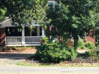 55 Hunter Bridge Road Stony Point, NC 28678 - Photo 3 of 32 a view of a garden with a small deck