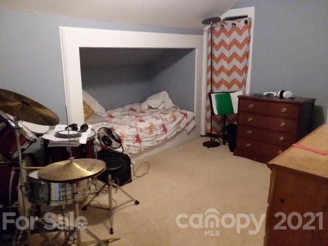 55 Hunter Bridge Road Stony Point, NC 28678 - Photo 25 of 32 a bedroom with a bed and a dresser