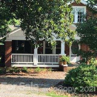 55 Hunter Bridge Road Stony Point, NC 28678 - Photo 4 of 32 a front view of a house with a garden