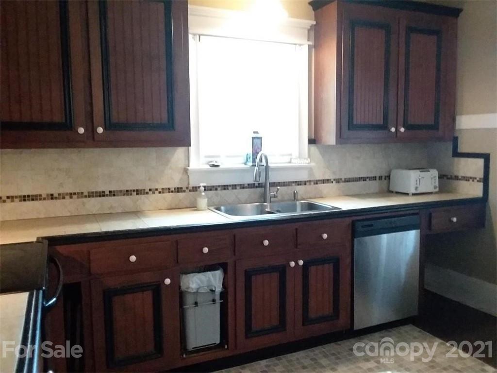 55 Hunter Bridge Road Stony Point, NC 28678 - Photo 32 of 32 a kitchen with a sink and cabinets