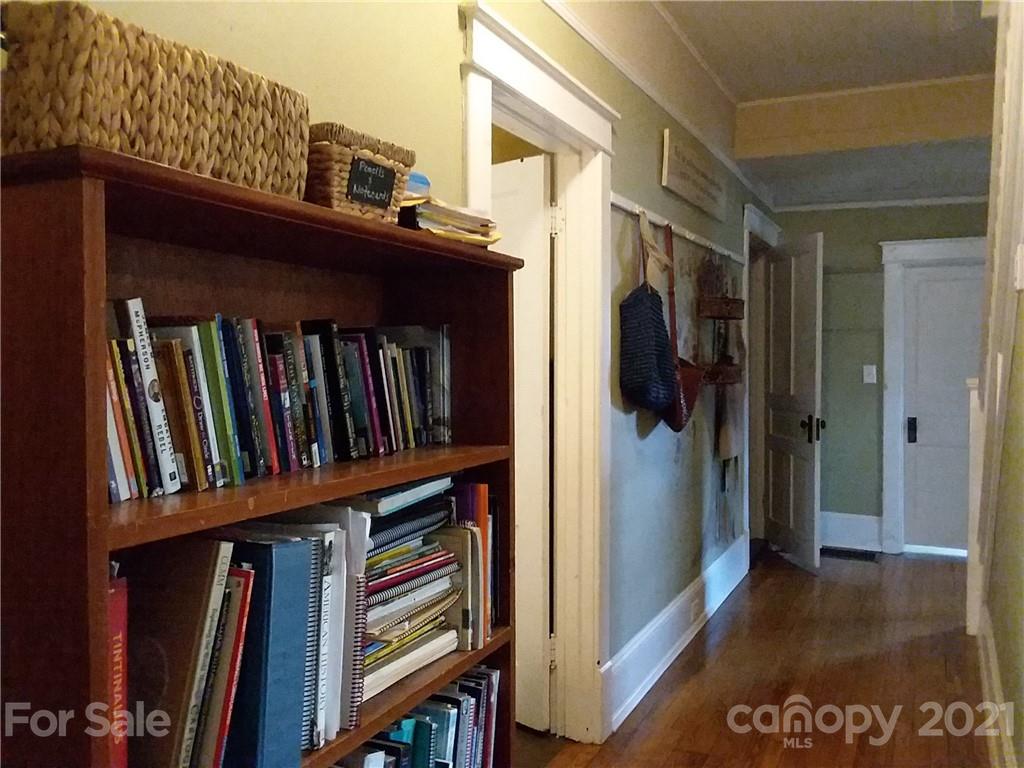55 Hunter Bridge Road Stony Point, NC 28678 - Photo 10 of 32 a view of a hallway with wooden floor and entryway