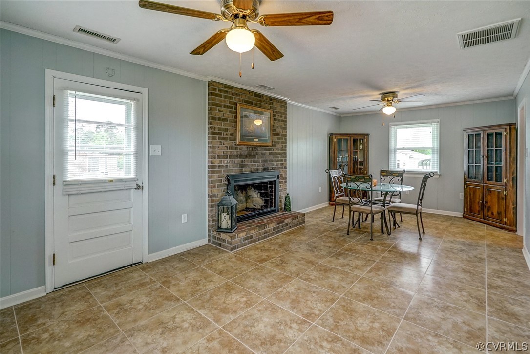 10601 River Road Chesterfield, VA 23838 - Photo 11 of 39 a view of a livingroom with furniture and a ceiling fan