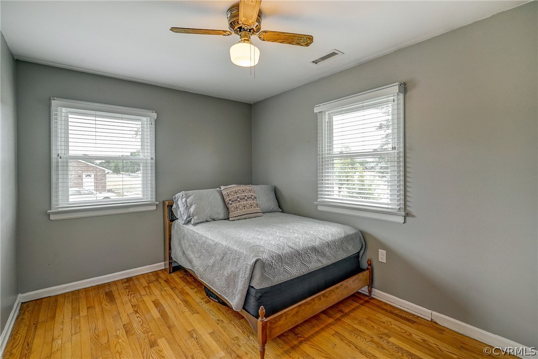 10601 River Road Chesterfield, VA 23838 - Photo 18 of 39 a bedroom with a bed and window