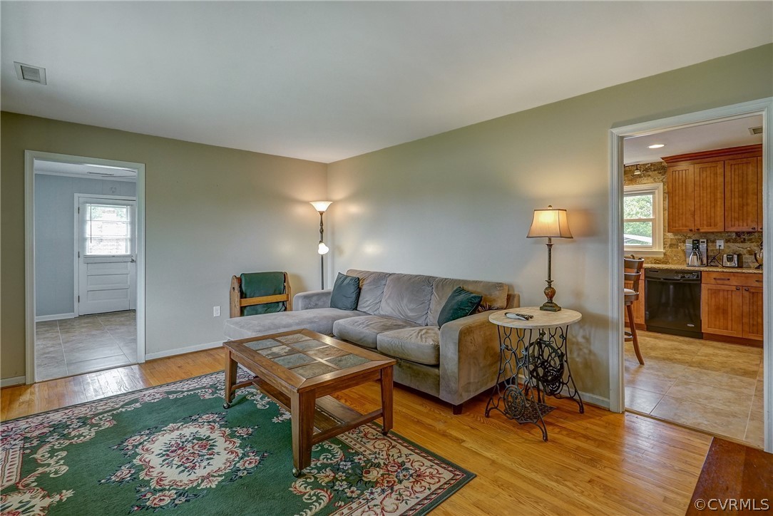 10601 River Road Chesterfield, VA 23838 - Photo 2 of 39 a living room with furniture and wooden floor