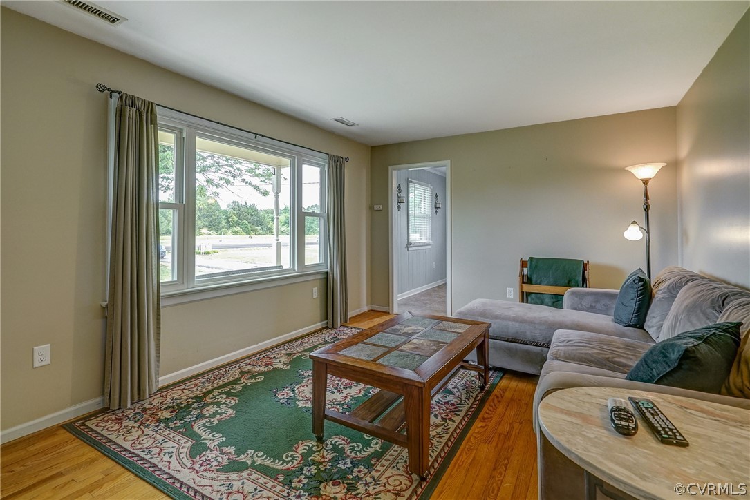 10601 River Road Chesterfield, VA 23838 - Photo 3 of 39 a living room with furniture and a rug