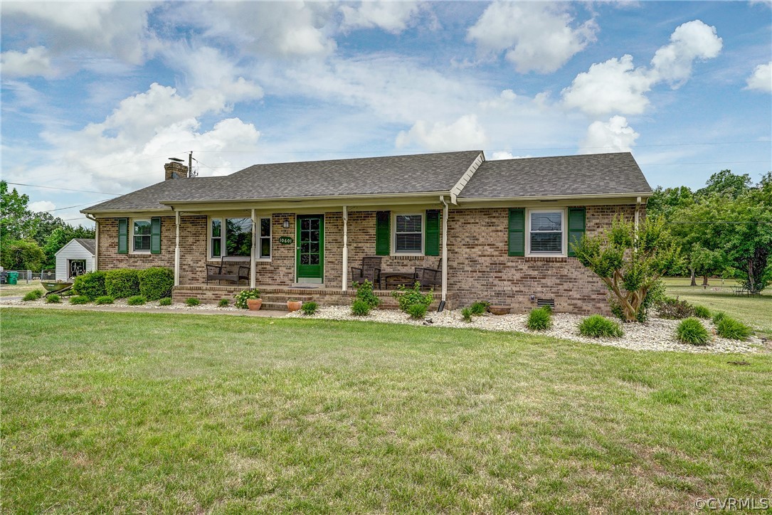 10601 River Road Chesterfield, VA 23838 - Photo 35 of 39 a front view of house with yard and green space