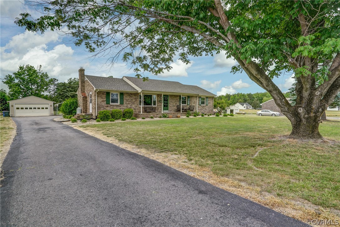 10601 River Road Chesterfield, VA 23838 - Photo 39 of 39 a front view of a house with garden