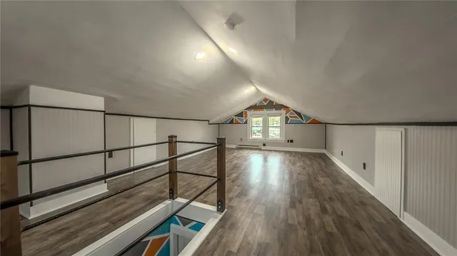 a view of entryway with wooden floor