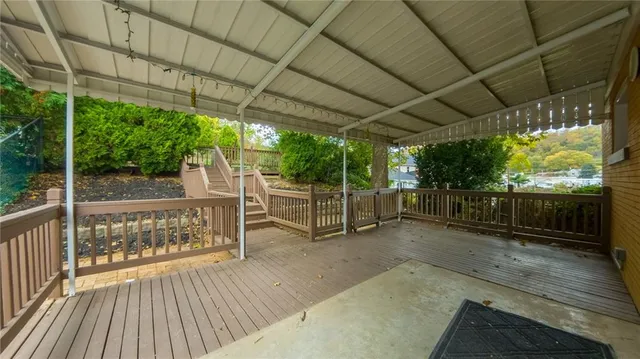 a view of outdoor space with wooden deck