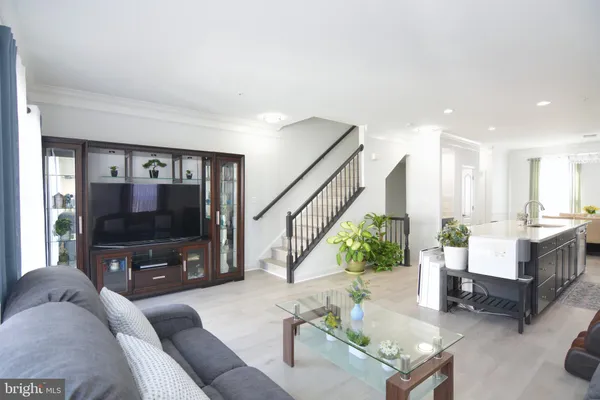 a bathroom with a sink and a large mirror