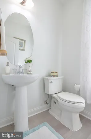 a bedroom with a bed and a mirror