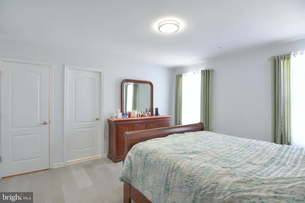 a bathroom with a shower and a toilet