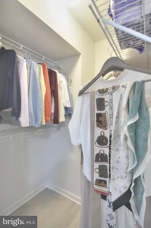 a view of a car garage door and windows