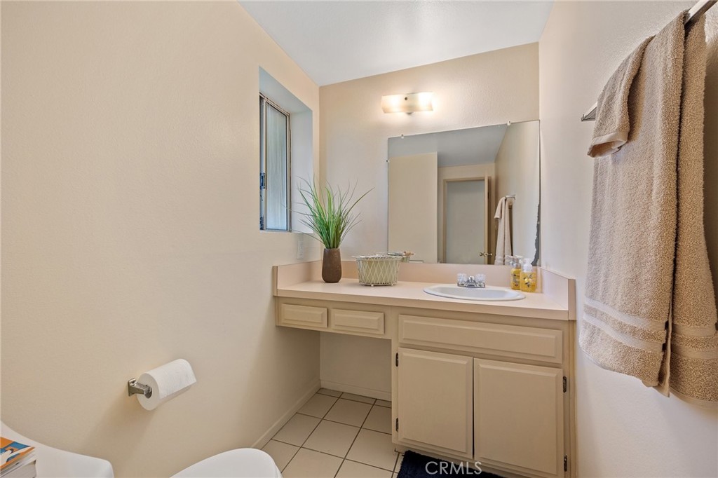 1435 Prospect Avenue, Unit B Placentia, CA 92870 - Photo 13 of 27 a bathroom with a sink and a mirror