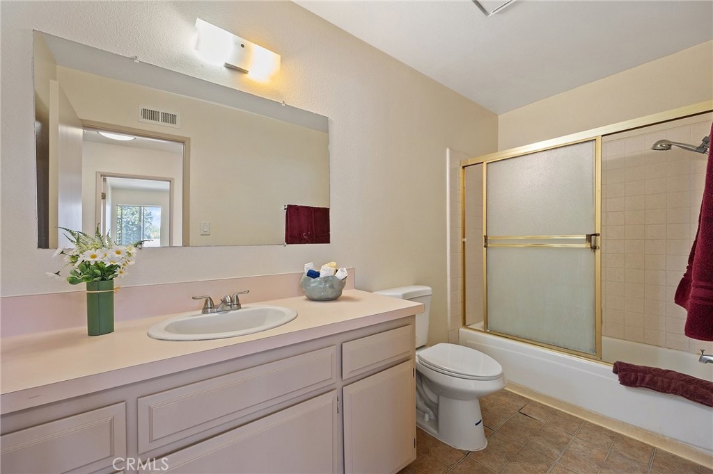 1435 Prospect Avenue, Unit B Placentia, CA 92870 - Photo 19 of 27 a bathroom with a sink toilet and shower