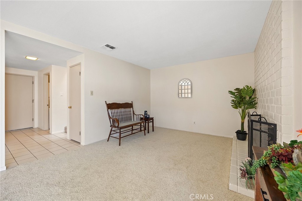 1435 Prospect Avenue, Unit B Placentia, CA 92870 - Photo 9 of 27 a view of workspace with furniture and a potted plant