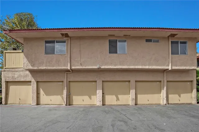 a view of a house with a garage
