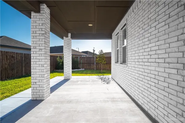 a view of swimming pool with seating space