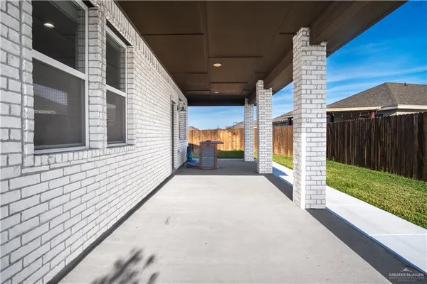 a view of a backyard of the house