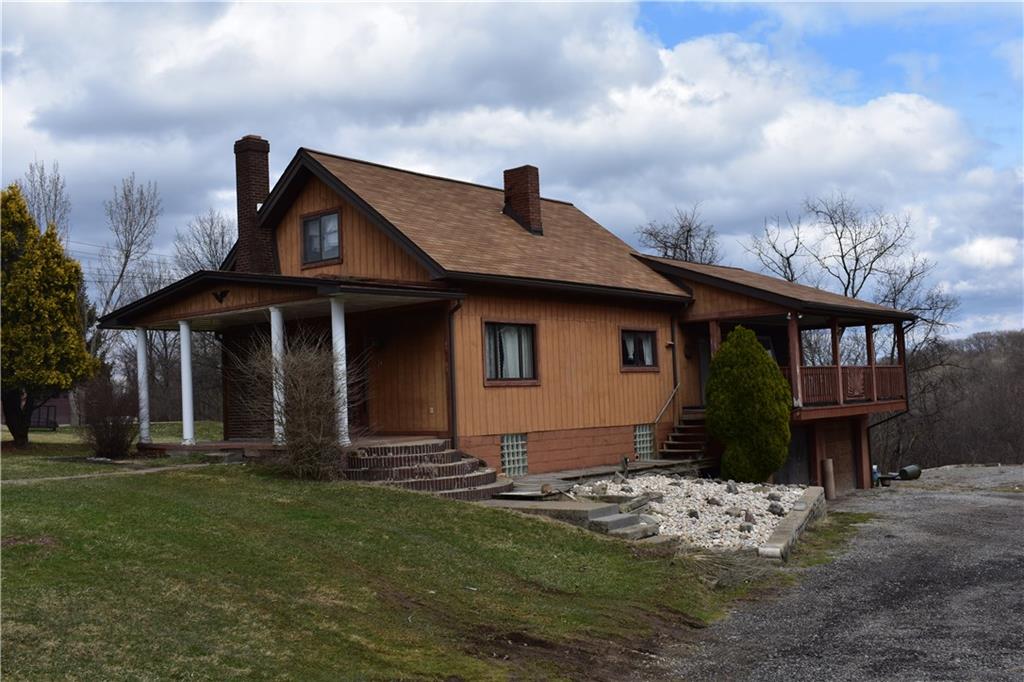 24 Spring Run Road Extension Coraopolis, PA 15108 - Photo 3 of 10 Home has a deck and a large 2 car garage with work area