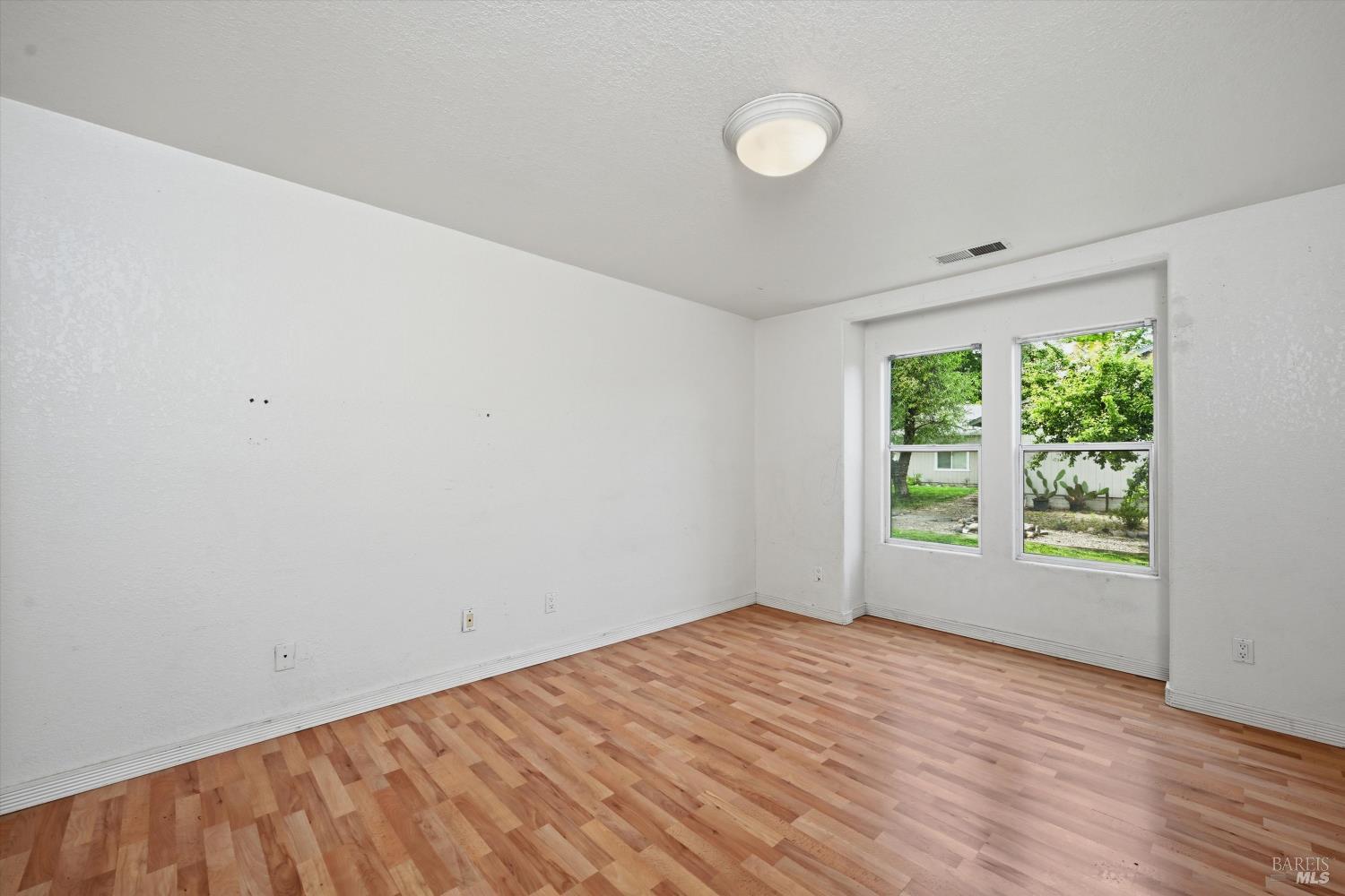 18057 Spyglass Road Hidden Valley Lake, CA 95467 - Photo 13 of 29 Primary bedroom.