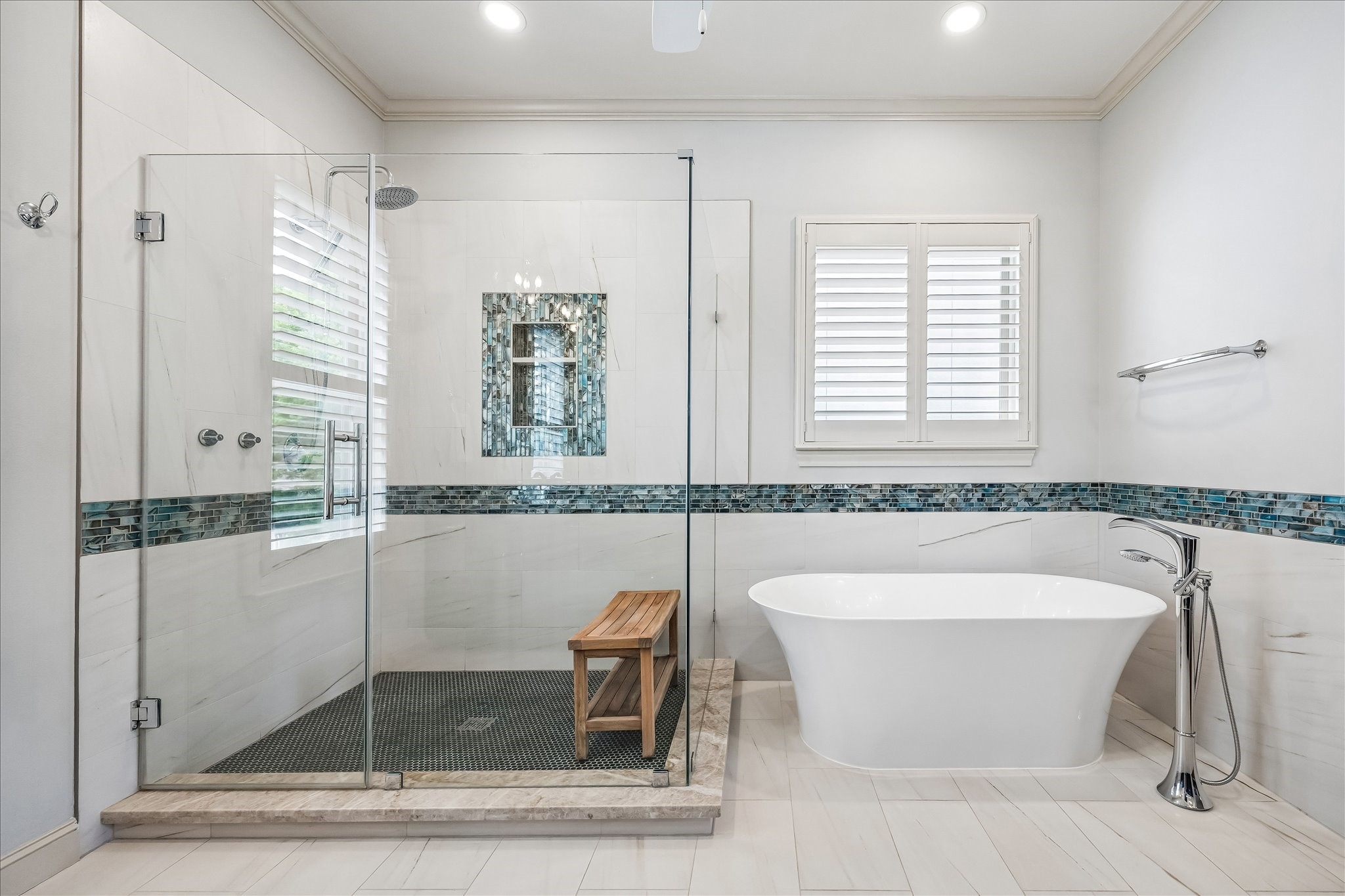 907 Queen Annes Road Houston, TX 77024 - Photo 12 of 31 Recently renovated primary bath (2024) featuring a freestanding soaking tub, oversized walk-in shower, and spa-inspired finishes throughout.