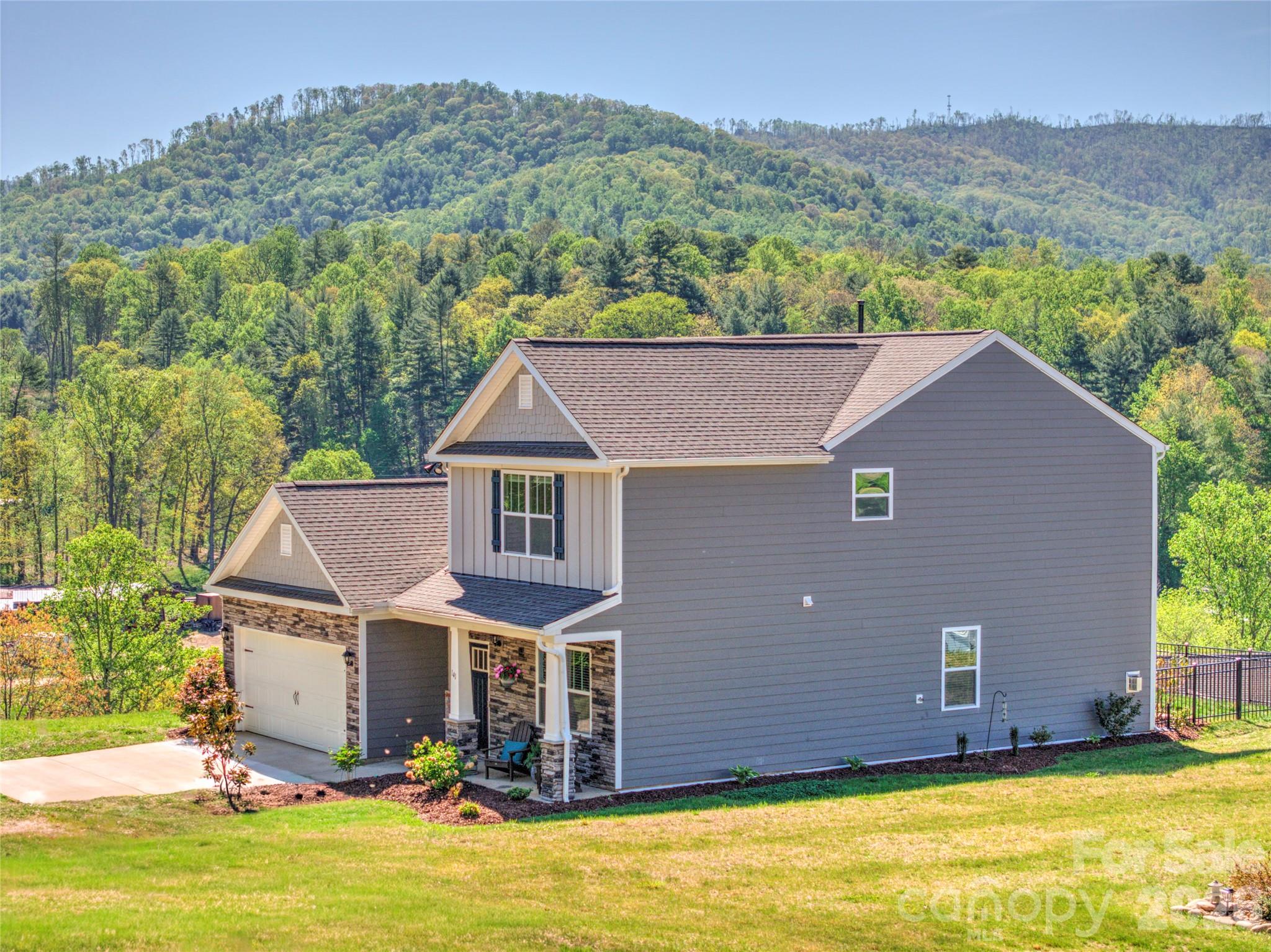 141 Amblers Knl Road Weaverville, NC 28787 - Photo 1 of 48 an aerial view of a house