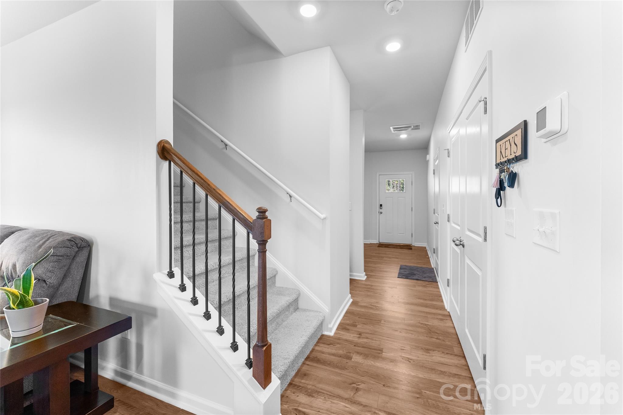 141 Amblers Knl Road Weaverville, NC 28787 - Photo 20 of 48 a view of a hallway with wooden floor and stairs