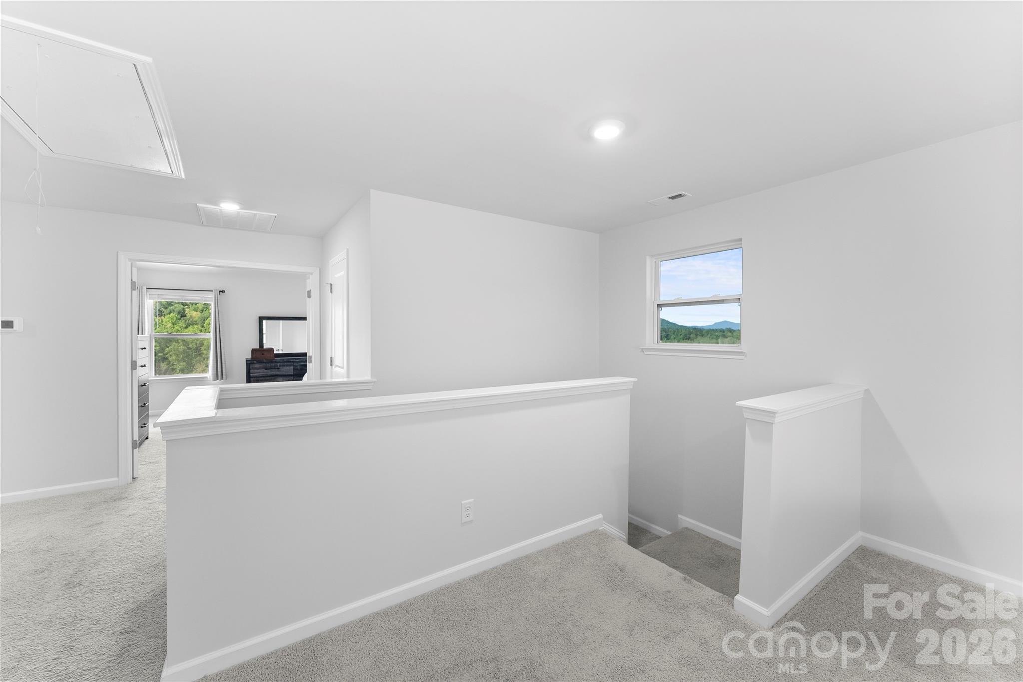 141 Amblers Knl Road Weaverville, NC 28787 - Photo 21 of 48 wooden floor in an empty room with a window