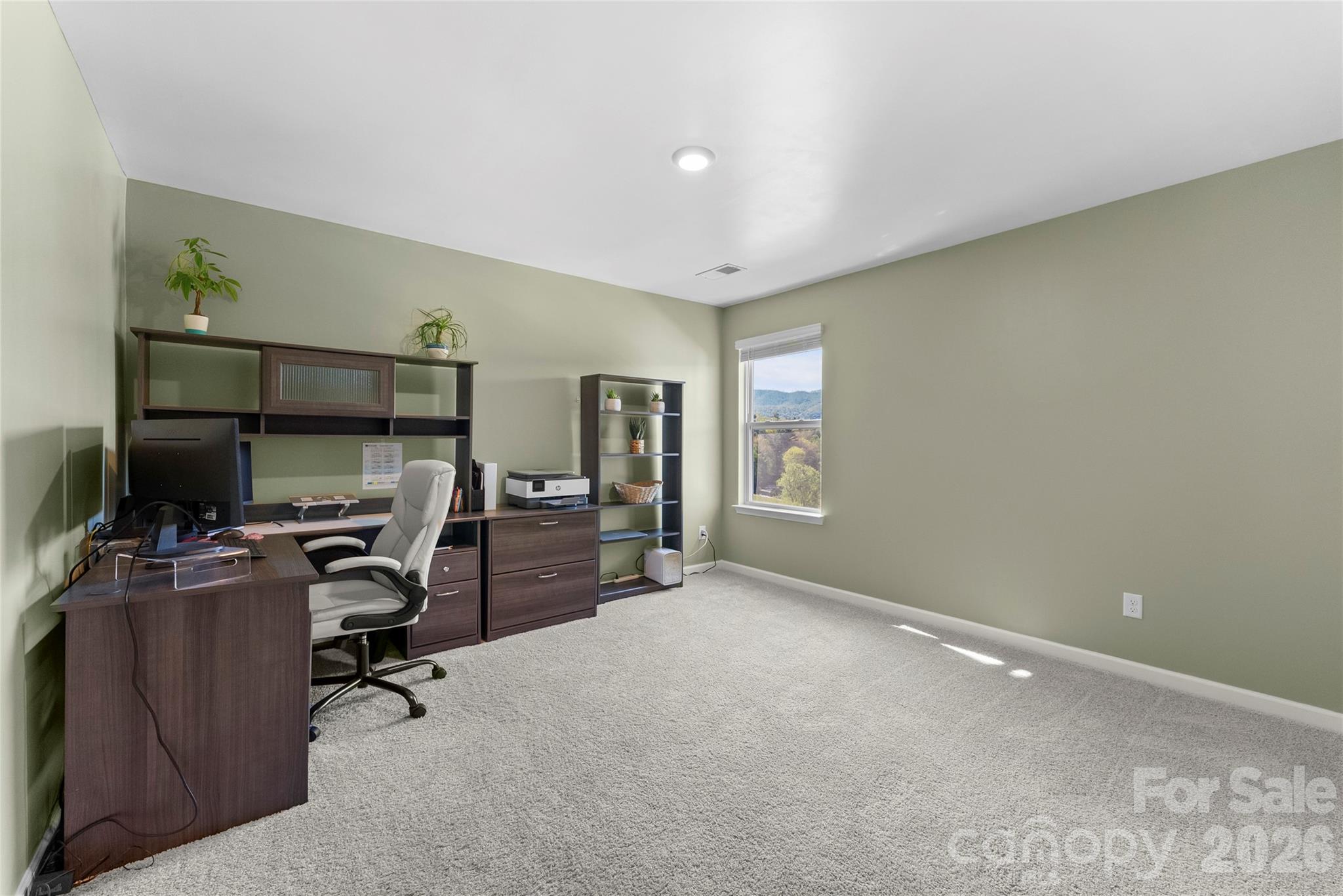 141 Amblers Knl Road Weaverville, NC 28787 - Photo 28 of 48 a view of a workspace with furniture and a window